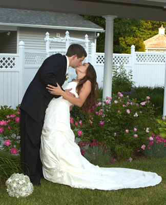 Bride and Groom at Executive Court garden in Manchester, NH.