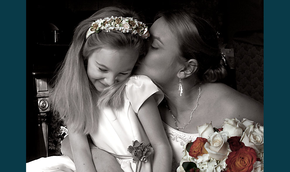 photo of bride and flower girl